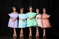 Evoke Dancers Modeling Pillow Dresses with Human Arms Belt Accessory